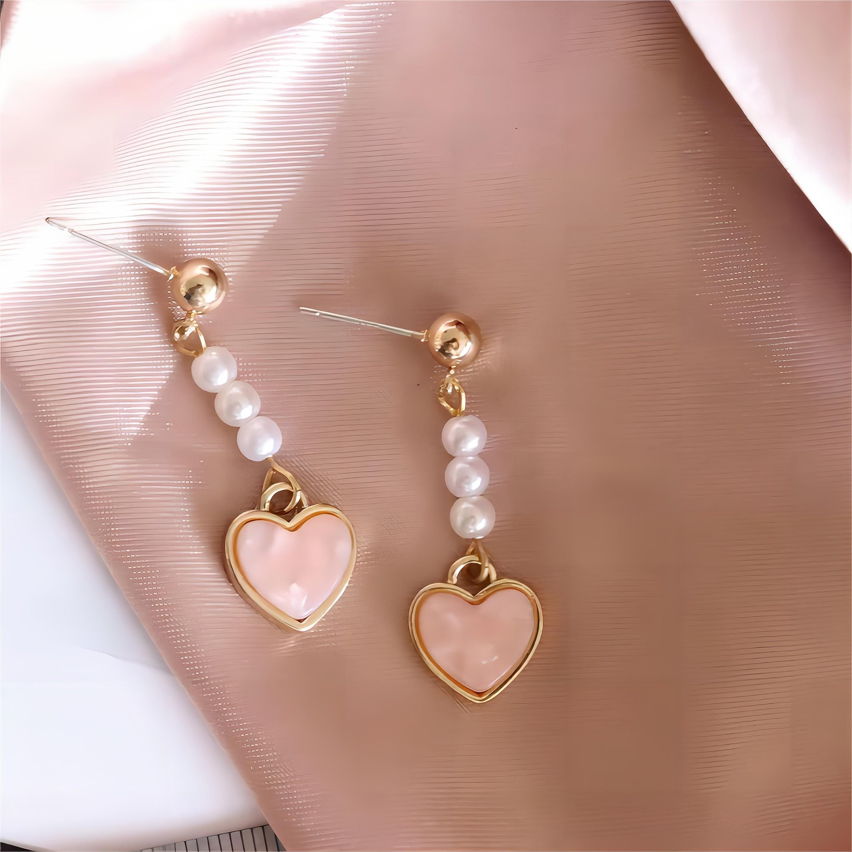 Eleganti orecchini pendenti a forma di cuore con perle
