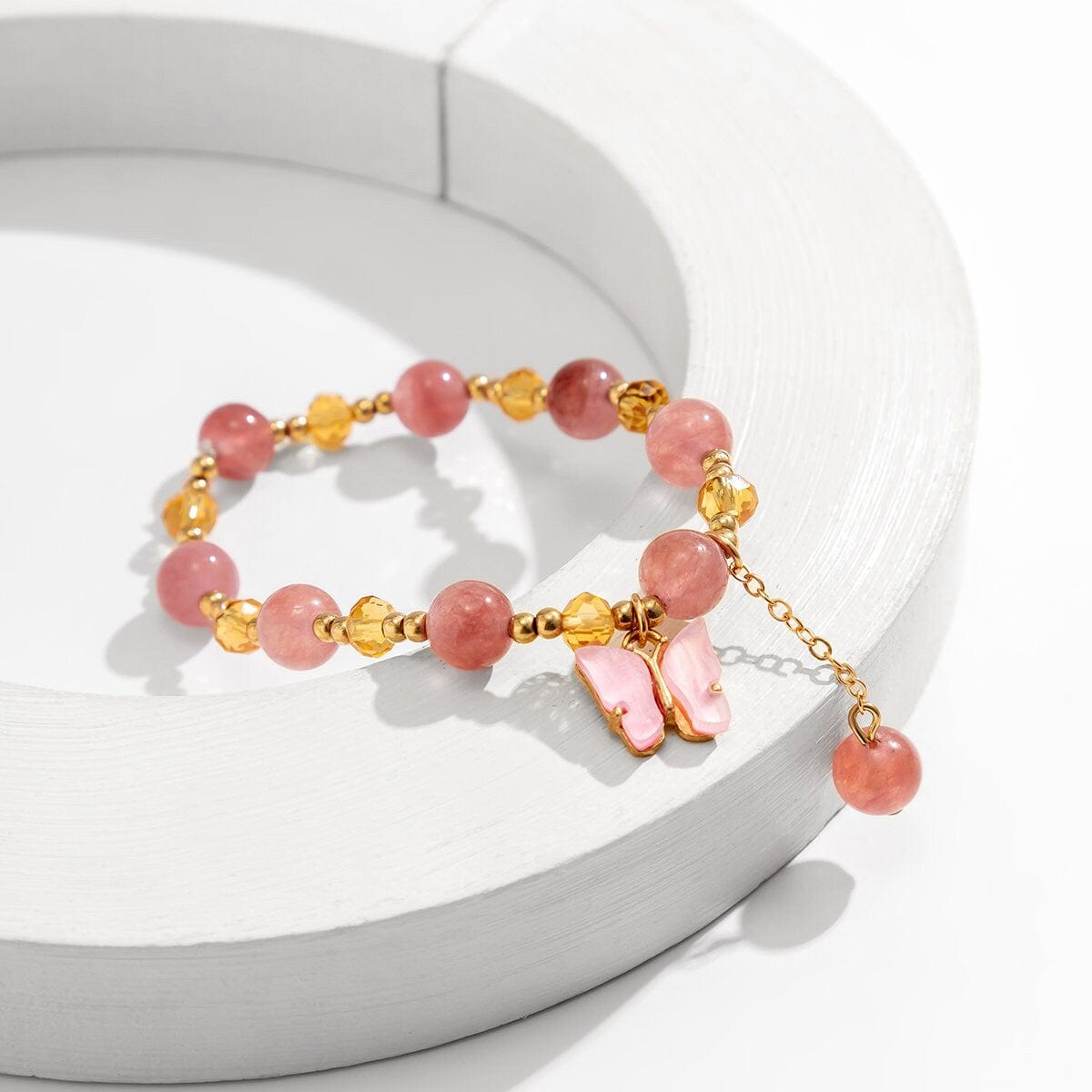 Bracciale con catena a sfere di cristallo naturale con ciondolo a farfalla rosa chic