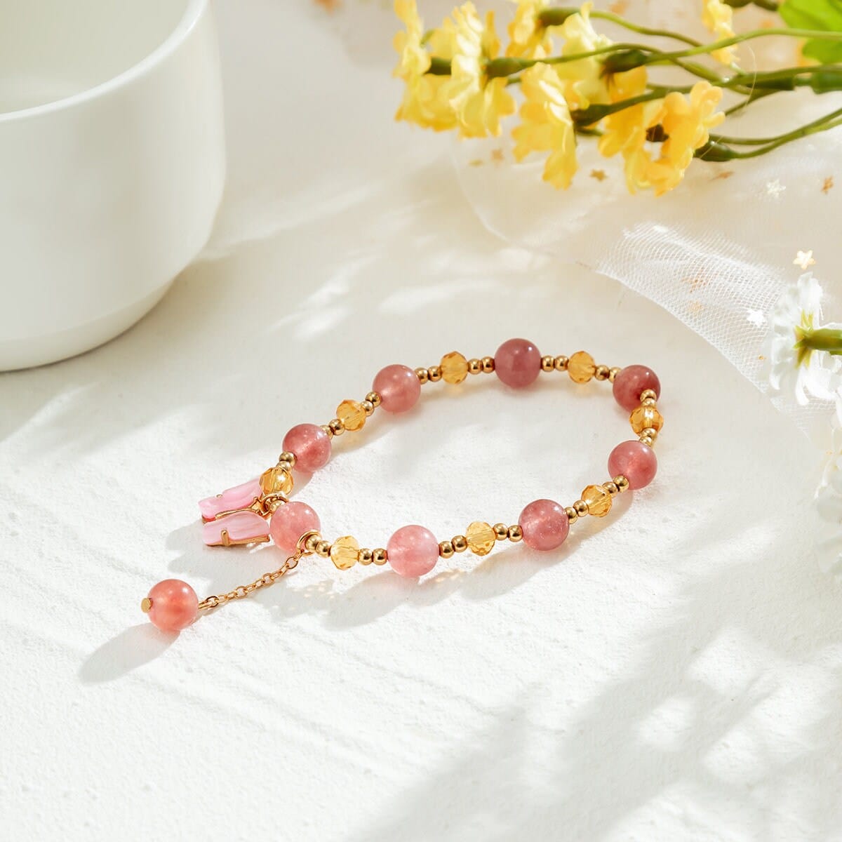 Bracciale con catena a sfere di cristallo naturale con ciondolo a farfalla rosa chic