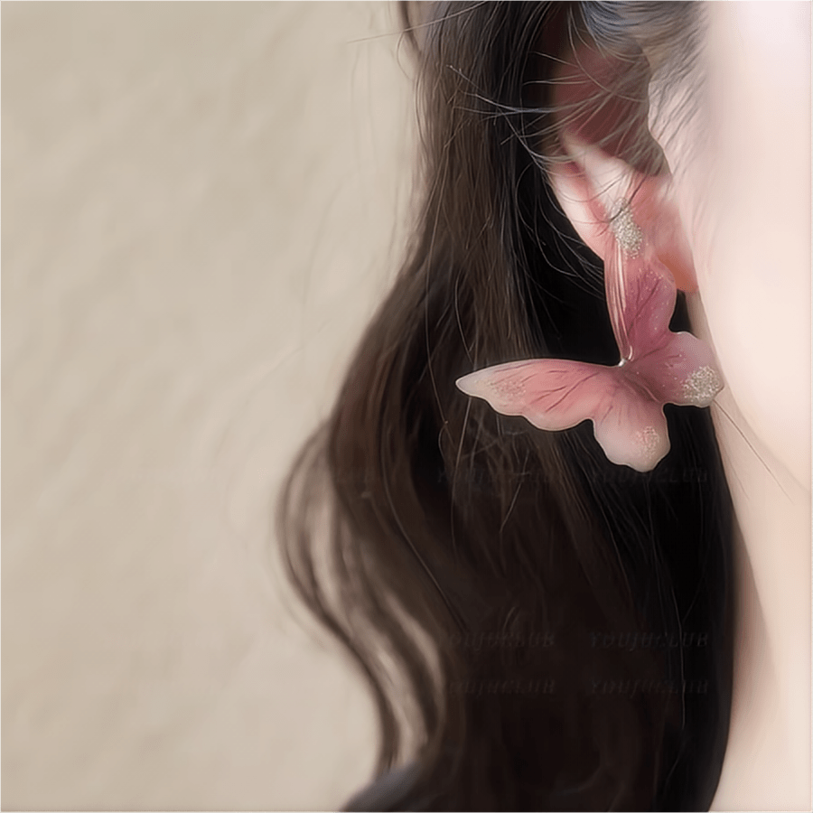 Eleganti orecchini pendenti a forma di farfalla rosa