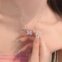 Collana con farfalla in pietra rosa con occhio di gatto