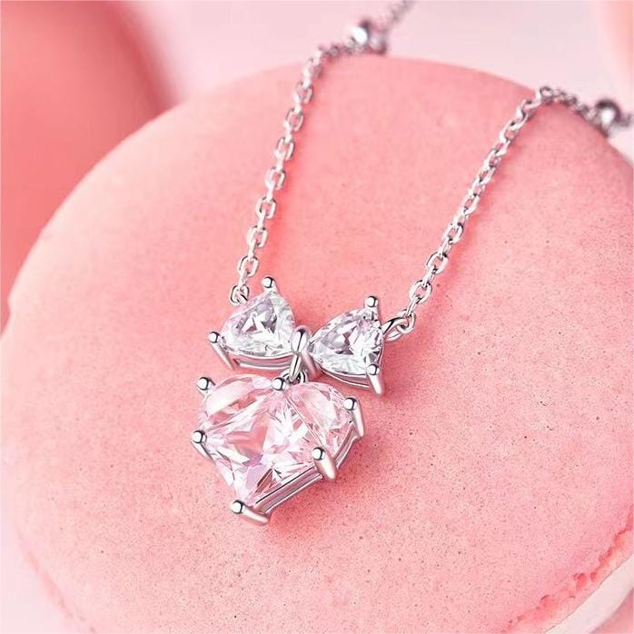 Collana con fiocco a forma di cuore in cristallo rosa chic