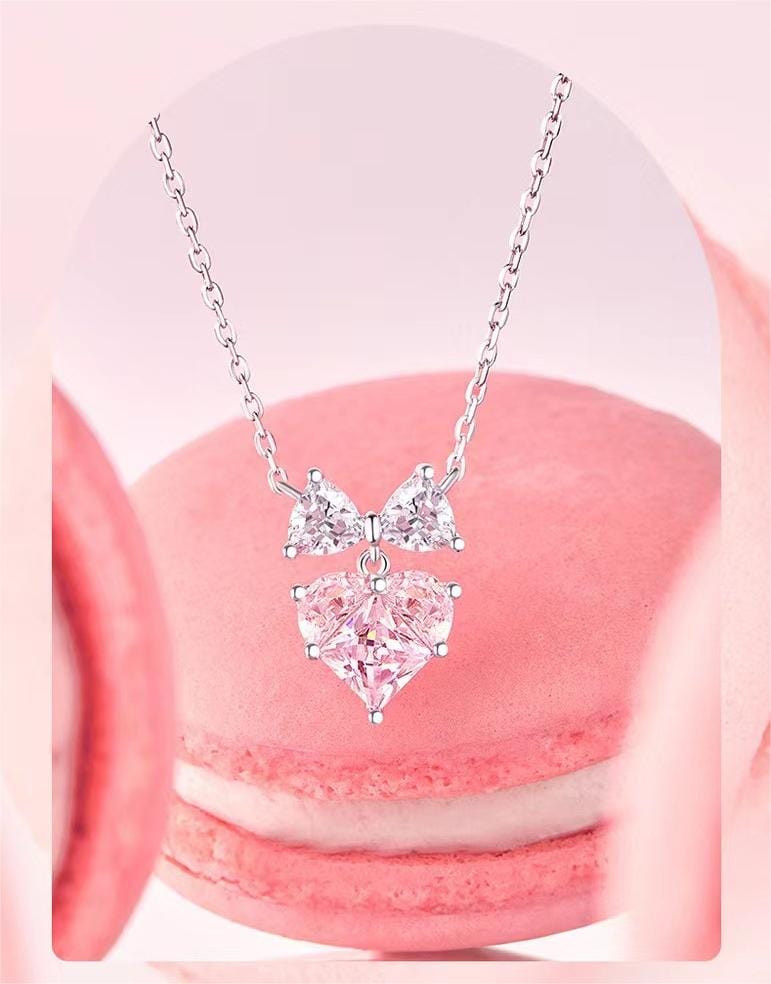 Collana con fiocco a forma di cuore in cristallo rosa chic