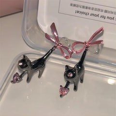 Eleganti orecchini a forma di gatto con fiocco pendente a forma di cuore in cristallo rosa